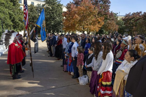 Members of the Kiowa Black Leggings Warrior Society and Zotigh Singers present the colors during a celebration at the Pentagon for National Native American Heritage Month, Nov. 8, 2023. Photo courtesy of Navy Petty Officer 1st Class Alexander Kubitza.