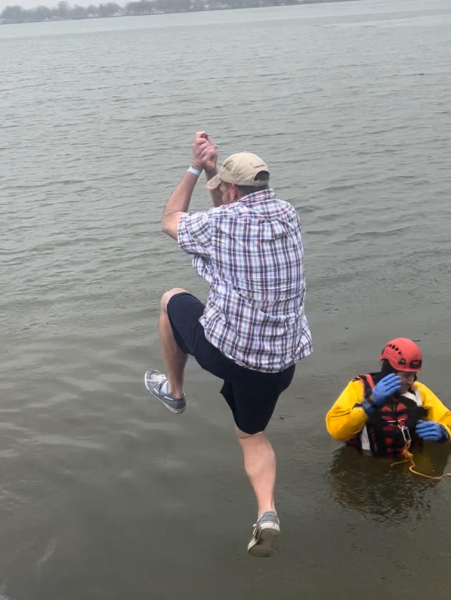 Superintendent of Lancaster City Schools Nathan Hale jumps in Buckeye Lake. Photo courtesy of Simmons.