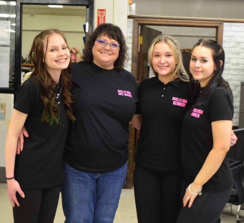 LHS Cosmetology teacher Leah Morgan with the three seniors,  Gabrielle Brown, Kennedy Morehart, and Lauren Hines. Photo courtesy of LHS Yearbook.