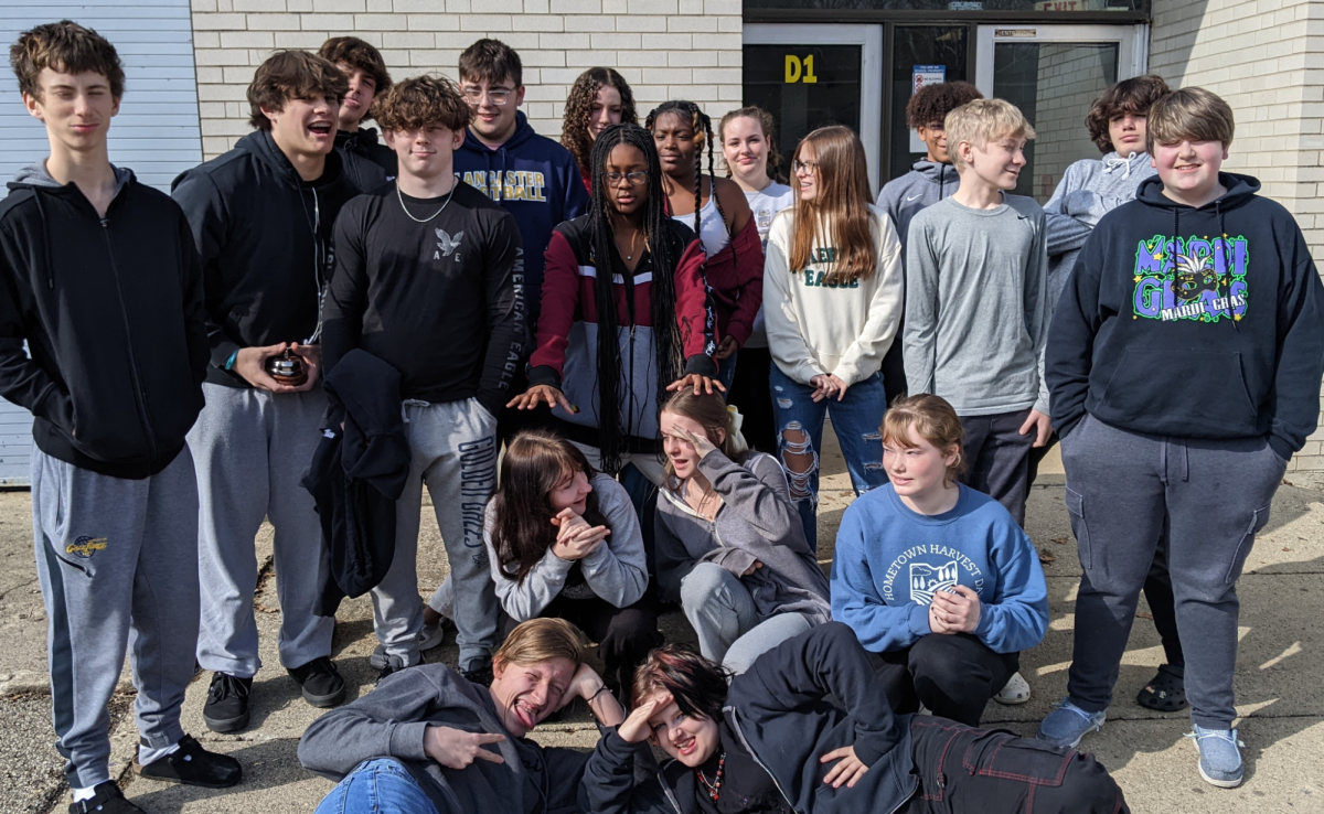 Several 2023 - 2024 LHS freshman students gather outside to pose for a photo.	
