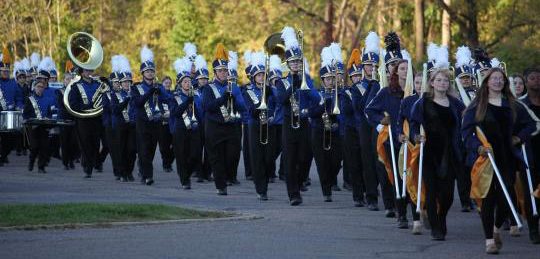 2024-2025 LHS Marching band performing at a parade.  Photo courtesy of Ryan Durbin.
