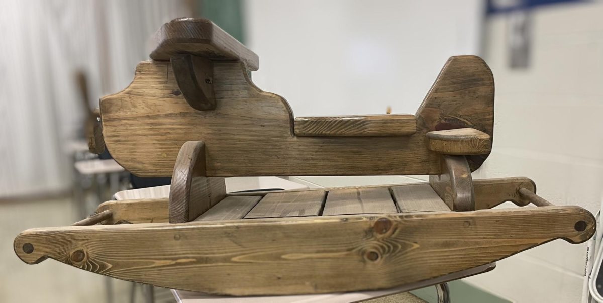 An example of the wooden airplane rocker made by LHS construction students.