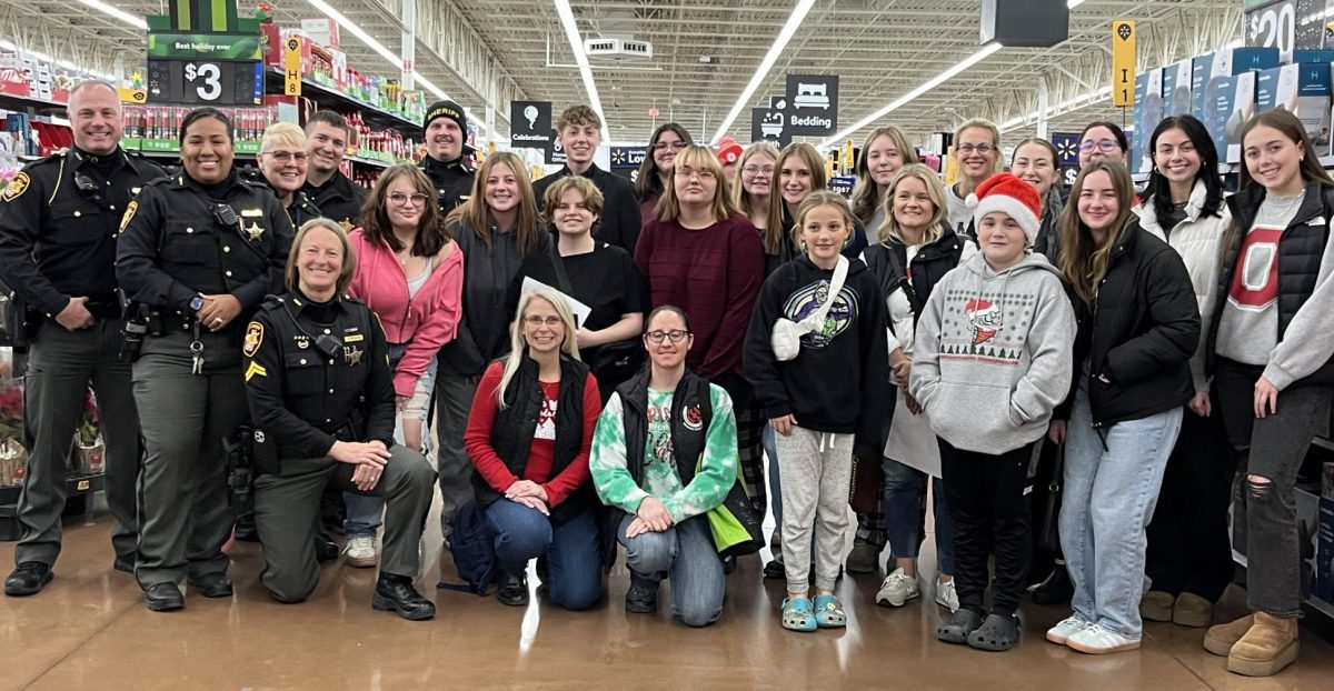 LHS Clubs and organizations gathered at Walmart to shop for gifts for the children. Photo courtesy of Etherington.