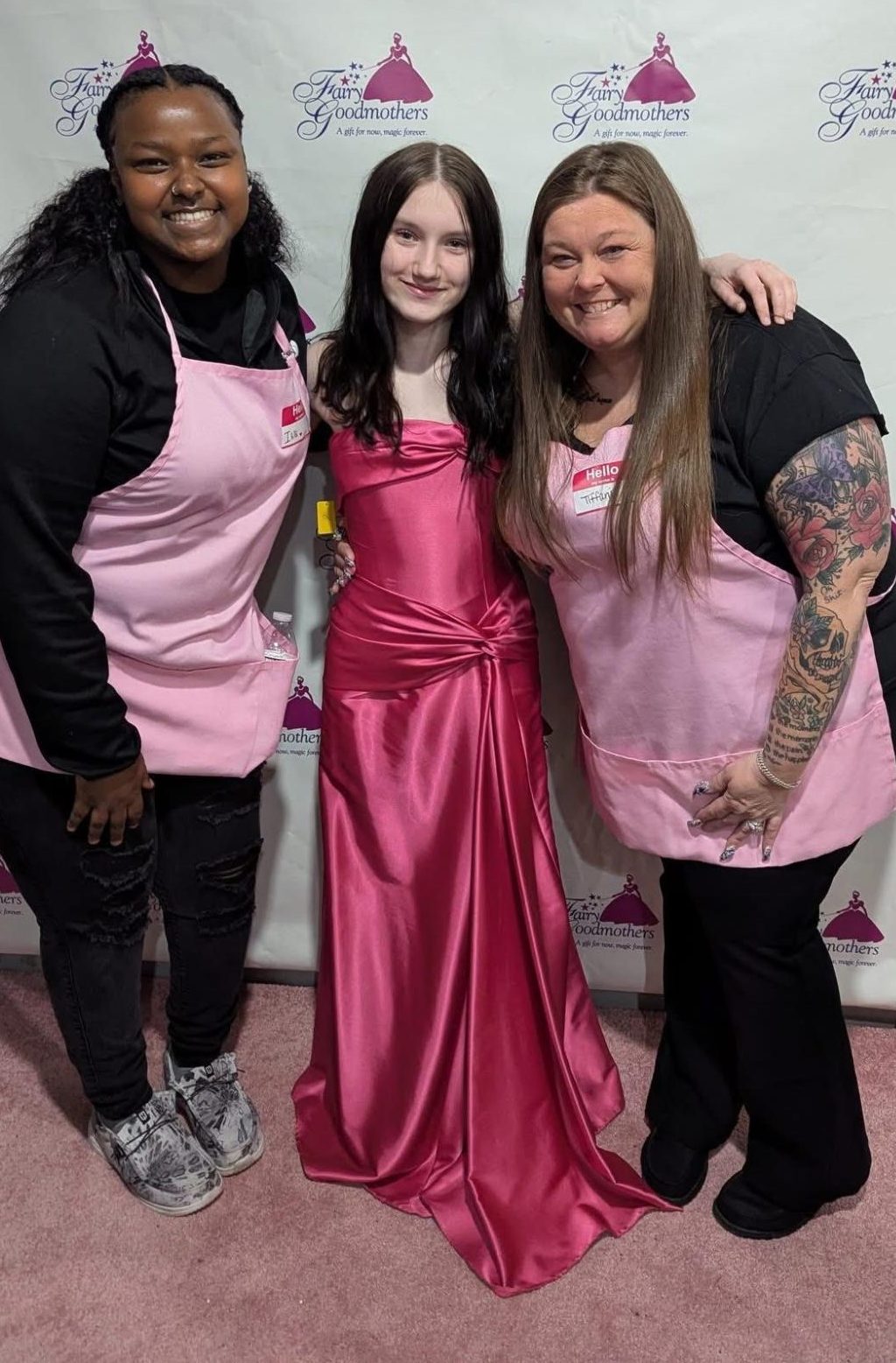 LHS freshman Dahlyla Swingle receives a prom dress from Fairy Goodmothers at Cinderella’s Closet and Boutique.  Photo courtesy of Swingle.
